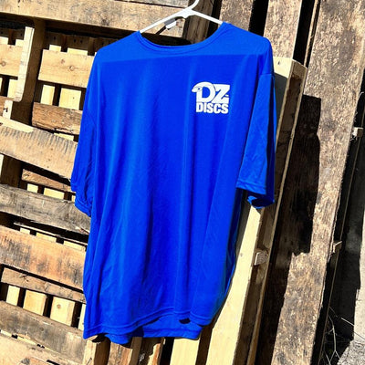 Vibrant blue DZ Discs A4 Dryfit performance shirt with a white logo on the left chest, draped over a hanger.