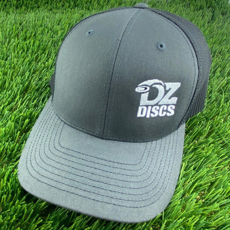 Dark gray Richardson 112 meshback snapback hat with a white Dz Discs logo embroidered on the front.