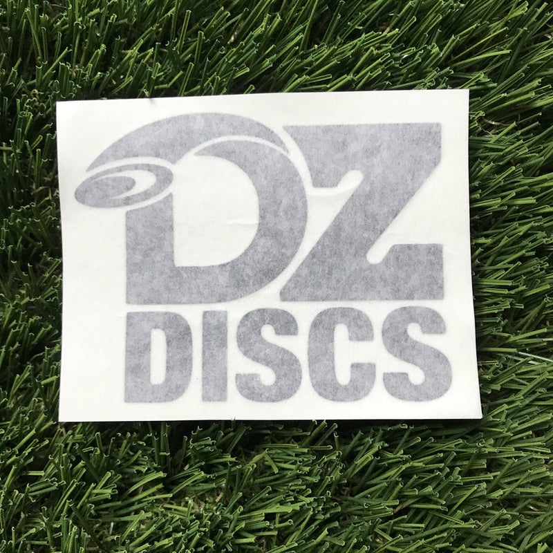 Gray DZ DISCS vinyl decal on a white backing with a shadowed, layered effect on the letters.
