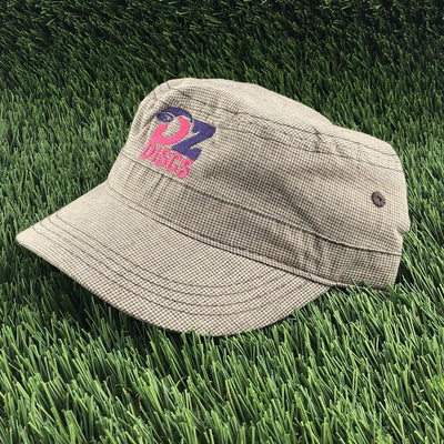 Houndstooth military-style hat with a black and white pattern, featuring a pink and purple embroidered "DZ DISCS" logo.