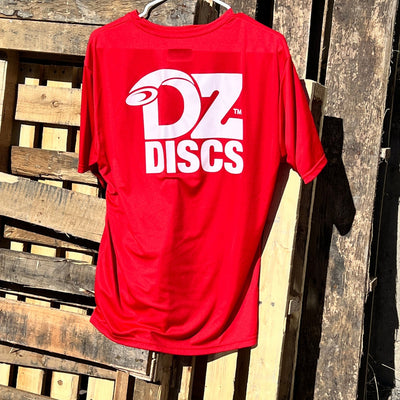 Red polyester dry-fit short-sleeved shirt with a large white "DZ DISCS" logo printed on the back.