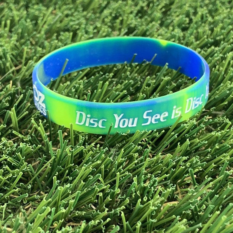 Vibrant teal blue and lime green silicone wristband with white "Disc You See is Disc" text.