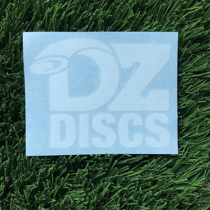White rectangle vinyl decal with the bright white "DZ DISCS" logo in bold capital letters and a disc golf disc graphic.