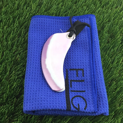 Blue Flightowel with a white and pink curved cleaning disc attached by a black cord.