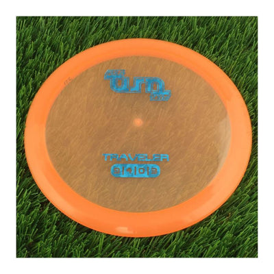 Translucent orange Full Turn Priority Traveler disc golf driver with a blue stamped logo and "172" weight marking.