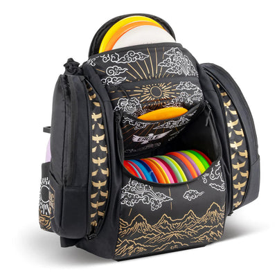 Black GRIP EQ AX5 Dismania Eagle McMahon Valhalla bag with gold clouds and mountains, containing colorful discs.