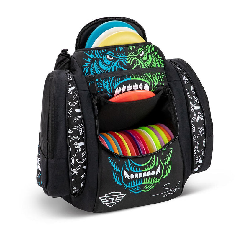 Black Grip EQ AX5 Series Tour Bag backpack with a colorful monster graphic, containing an array of multicolored discs.