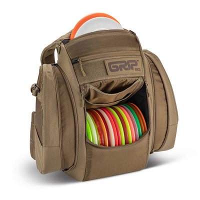 Brown Grip EQ BX3 Series Tour Bag backpack made of durable CORDURA material, packed with colorful disc golf discs.