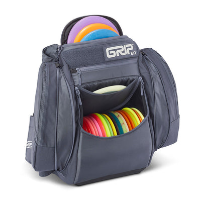 Charcoal gray GRIPeq AX5 Series Tour Bag backpack with multiple pockets holding colorful disc golf discs.
