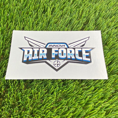 White vinyl Innova Air Force die cut sticker with blue lettering outlined in black, featuring subtle wing designs.