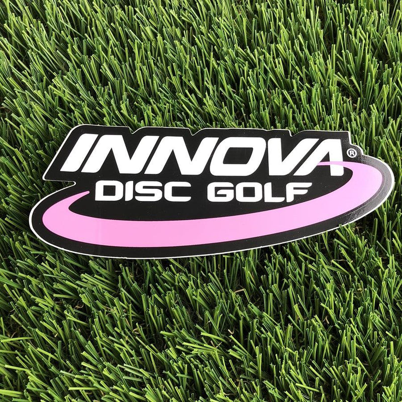 Black Innova Disc Golf die cut sticker with a pink stripe and white Innova text.