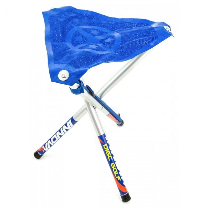 Blue Innova Park and Fly disc golf stool with a peace sign and stars design on the fabric seat.