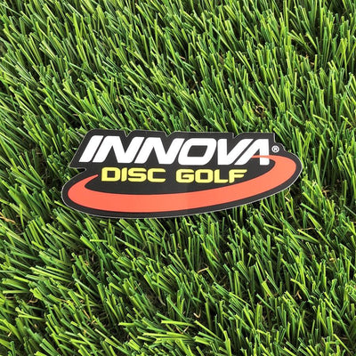 Die-cut Innova Disc Golf sticker featuring white Innova text, yellow DISC GOLF text, and a red curved accent.