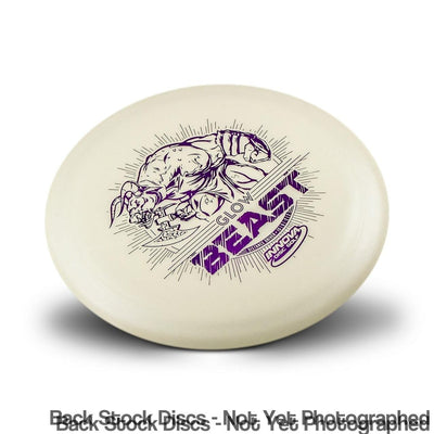 White Innova DX Glow Beast disc golf putter with a purple minotaur holding a battle axe stamp.