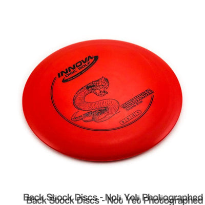 Red Innova DX Sidewinder distance driver disc golf disc with a black snake stamp and flight numbers 9 5 -3 1.