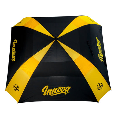 Black and bright yellow Innova Flow Umbrella, featuring a prominent Innova logo on each panel and a compass design.