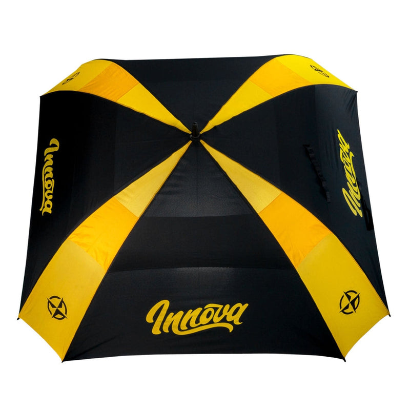 Black and bright yellow Innova Flow Umbrella, featuring a prominent Innova logo on each panel and a compass design.