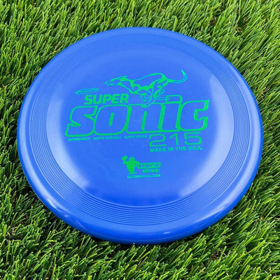 Blue Innova Hero Super Sonic 215 disc with vibrant green lettering and a running dog graphic.
