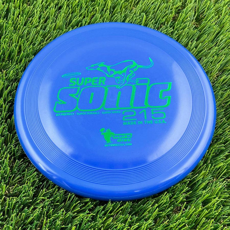 Blue Innova Hero Super Sonic 215 disc with vibrant green lettering and a running dog graphic.