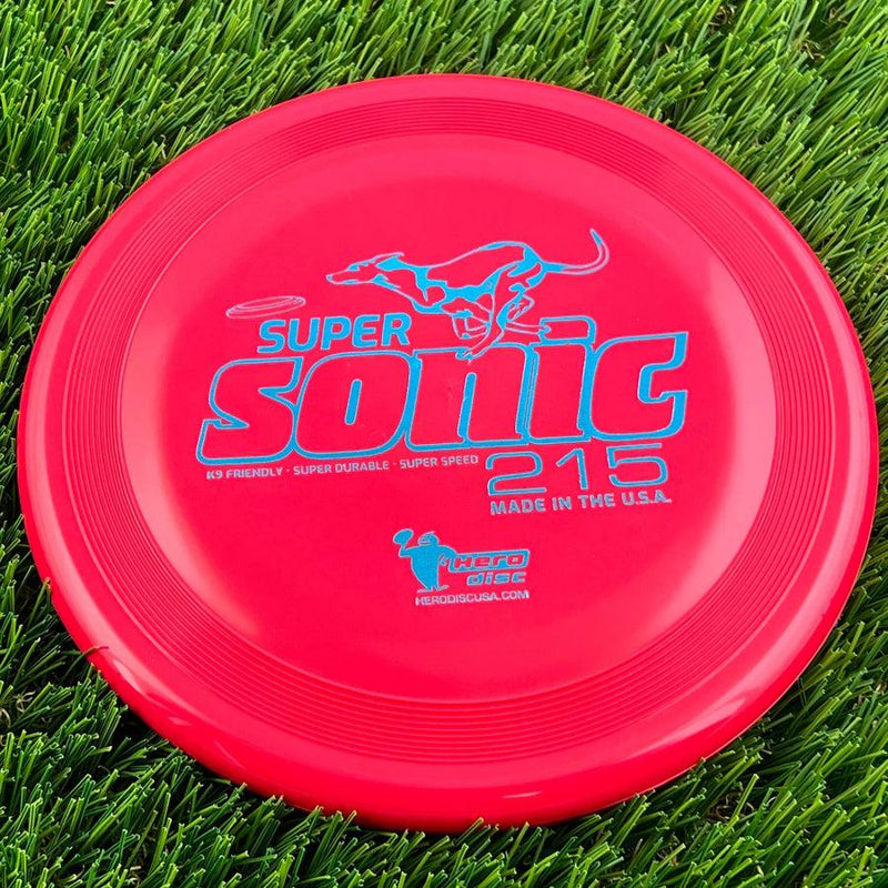 Red Innova Hero Super Sonic disc with bright blue lettering, a leaping greyhound logo, and concentric rings.