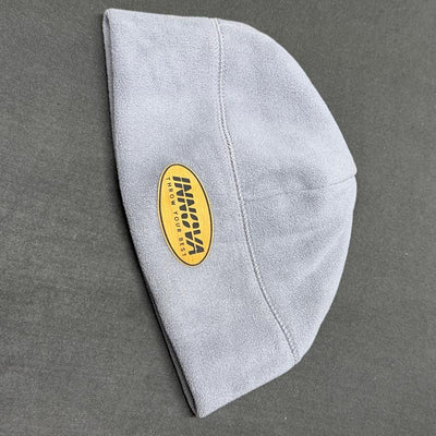 Light gray fleece beanie with contrast stitching and an oval Innova "Throw Your Best" patch.