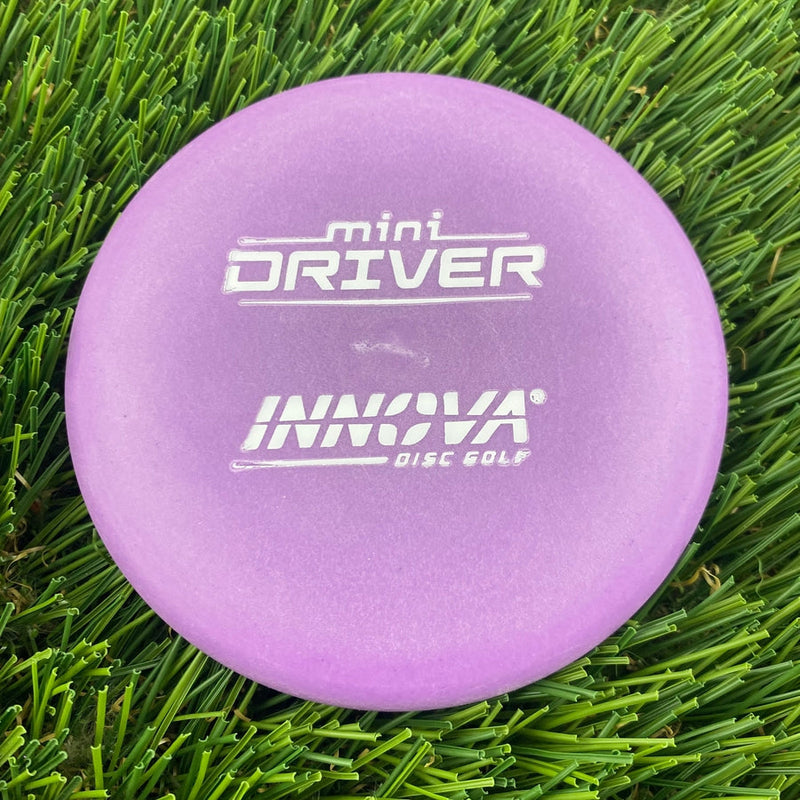 Light purple Innova Mini Driver disc golf marker with white text branding and a glossy finish.