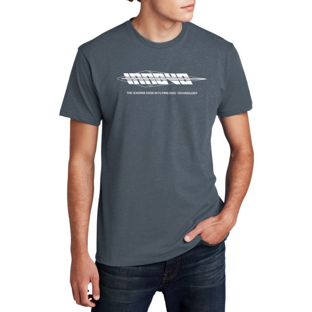A man models a charcoal gray Innova Patent t-shirt with a white abstract company logo and slogan.