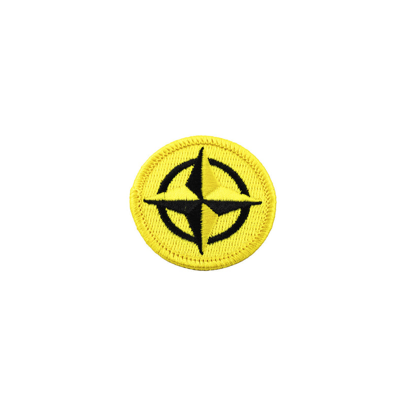 Innova Prime Star Circle yellow and black embroidered patch with a detailed compass design.