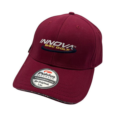 Maroon Pukka Headwear Innova baseball cap with embroidered white and blue "INNOVA DISC GOLF" logo.