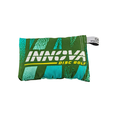 Green Innova Sportsac Macro disc golf grip bag with white and teal accents, featuring the Innova Disc Golf logo.