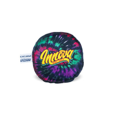 Circular Innova Sportsack with a vibrant purple, green, and red tie-dye pattern and an official tag.