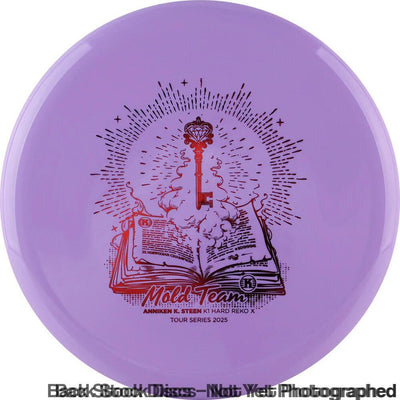 Lavender Kastaplast K1 Hard Reko X disc with a central red foil graphic featuring a ornate key atop an open book.