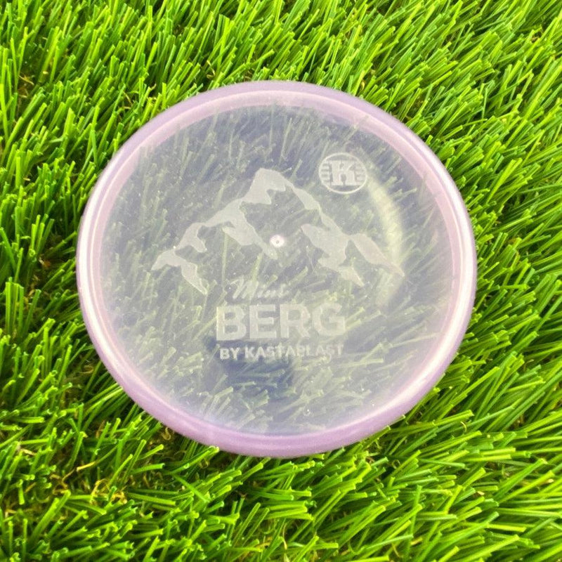 Translucent purple Kastaplast Mini Berg marker disc featuring a mountain stamp and brand logo.