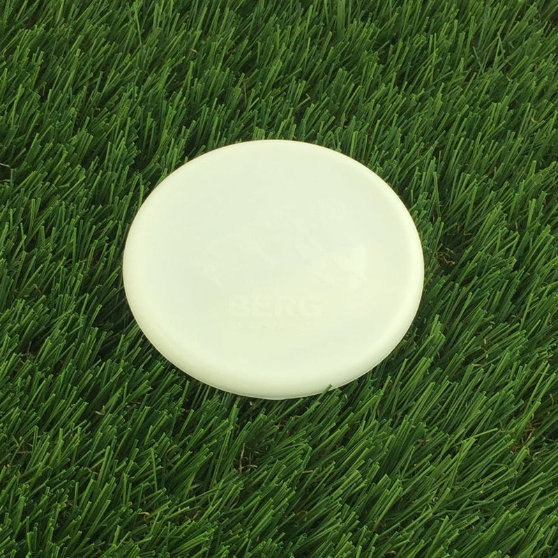 White Kastaplast Mini Berg marker disc featuring the embossed BERG logo with Kastaplast branding underneath.