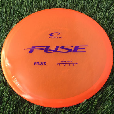 Translucent orange Latitude 64 Frost Line Fuse midrange disc golf disc with a purple frost stock stamp.