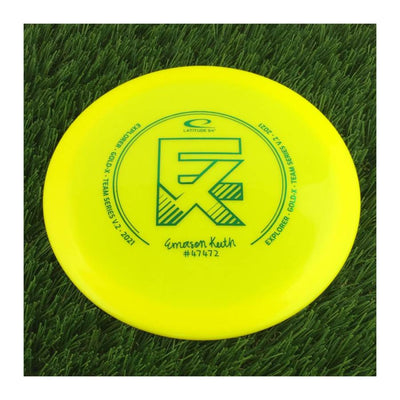 Solid yellow Latitude 64 Gold X-Blend Explorer disc with a green Emerson Keith 2021 Team Series V.2 stamp.