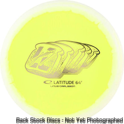 Yellow Latitude 64 Opto Ice Orbit Compass disc with a white rim and toasted bread metallic golden stamp.