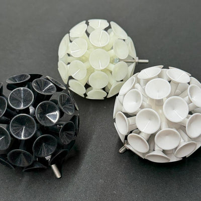 Three suction ball attachments with M5 threads, one black, one glow white, and one bright white.