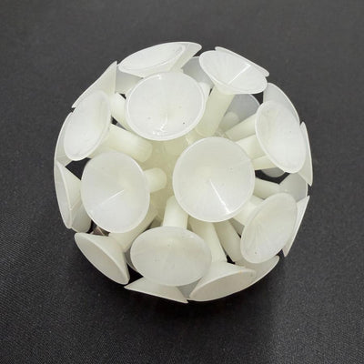 A white translucent max disctance glow suction ball attachment with numerous individual suction cups arranged spherically.