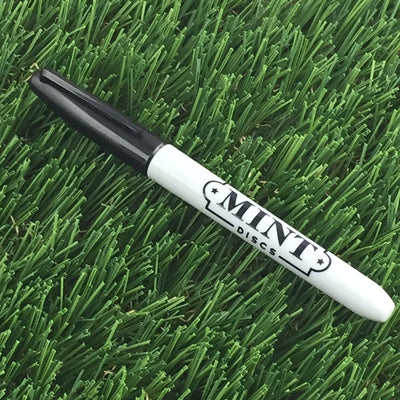 White Mint Discs Sharpie permanent marker with a black cap and prominent black "MINT DISCS" logo.
