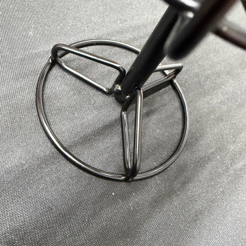The MVP Black Hole Micro basket base features black metal rings and sturdy vertical support bars.