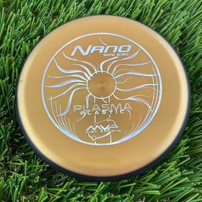 Golden MVP Nano Plasma Mini Marker disc with a prominent silver stamped sun design and branding.