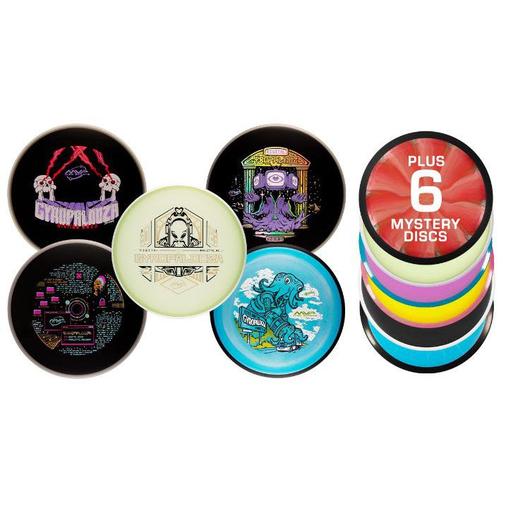Collection of MVP Gyropalooza 2023 disc golf discs in black, cream, and blue with various graphic designs.