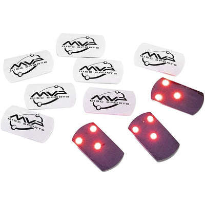 Ten MVP LED disc golf lights, six white with black logos and four translucent purple with three red lights on.