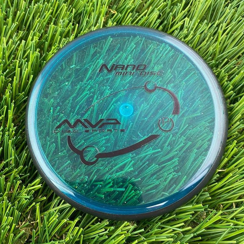 Transparent teal MVP Nano Mini Disc golf marker with a black rim and black MVP Sports logo.
