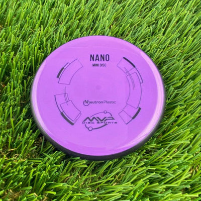MVP Nano Neutron Mini Marker disc golf mini in vibrant purple plastic with black details.