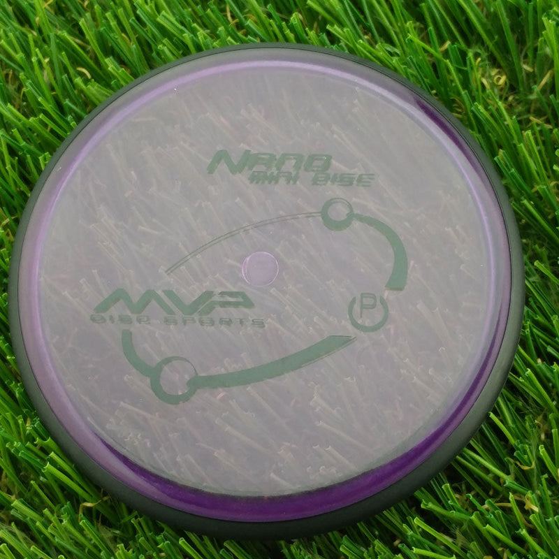 Round MVP Nano Proton Mini Marker disc with a translucent purple center and a dark black rim.
