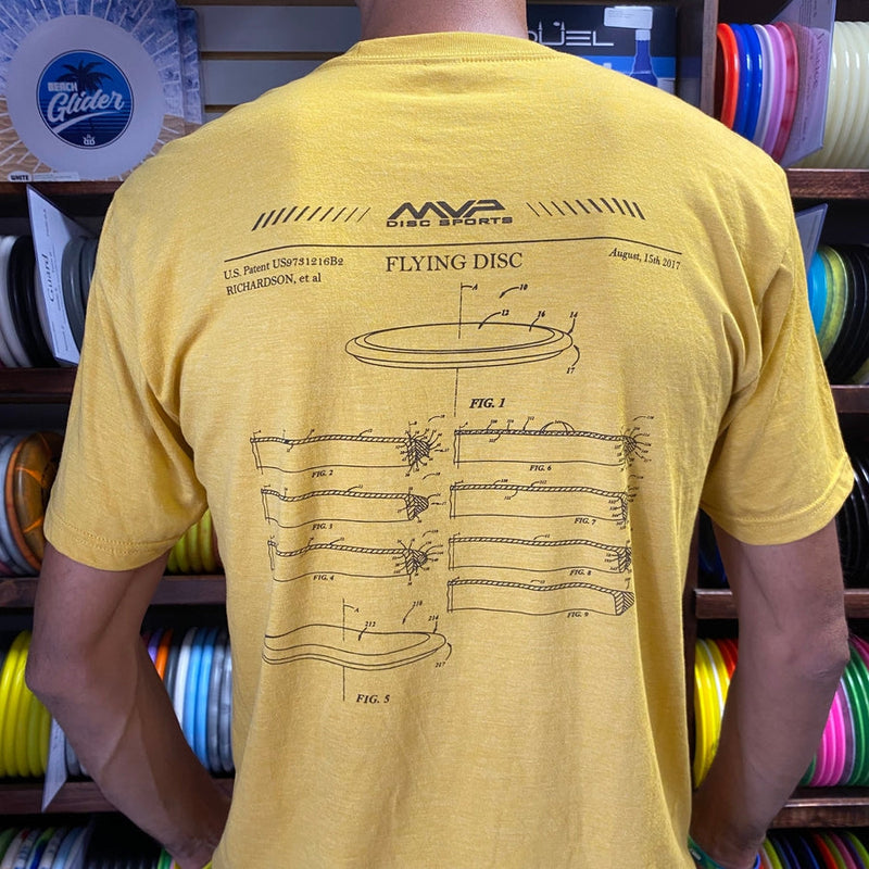 Mustard yellow MVP Disc Sports tee shirt with black "Flying Disc" patent diagrams and text on the back.