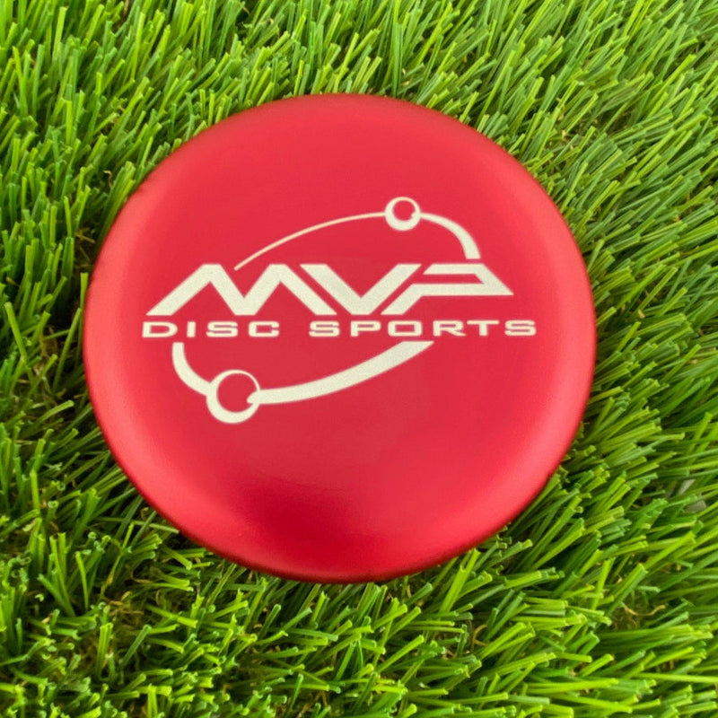 Red MVP metal marker disc with a white MVP Disc Sports Orbit logo on the flight plate.