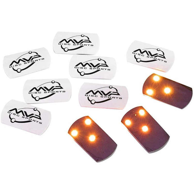 Six white rectangular MVP Disc Sports lights and four illuminated MVP Tri Lit LED lights, some with orange glowing bulbs.